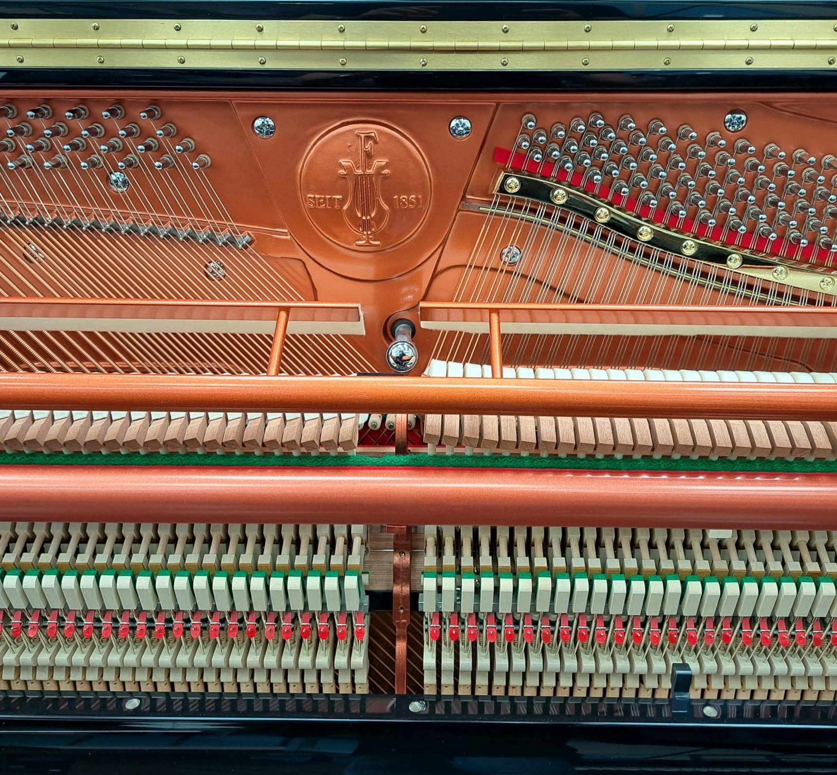 Feurich 133 upright Piano in gloss black – Gallery image – Roberts Pianos Oxford