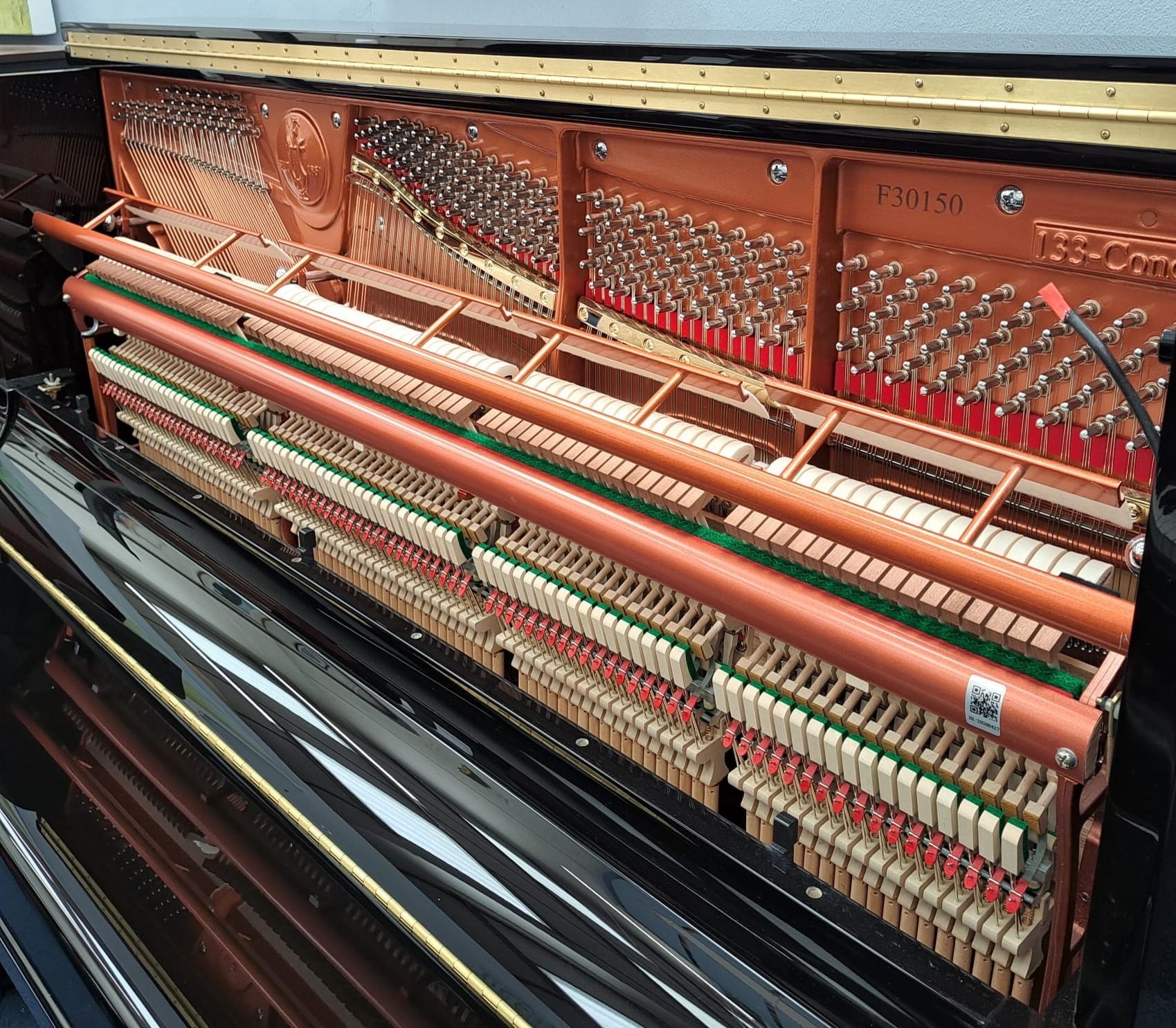 Feurich 133 upright Piano in gloss black – Gallery image – Roberts Pianos Oxford