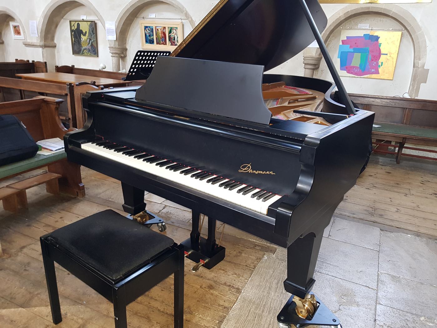 Danemann concert grand Piano in satin black – Featured image – Roberts Pianos Oxford