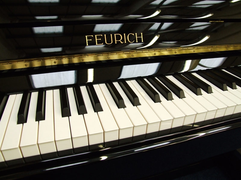 Feurich 122 upright Piano in black polyester – Gallery image – Roberts Pianos Oxford