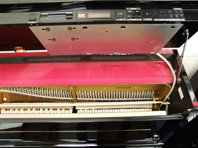 Yamaha MX101R upright Piano in bright black – Gallery image – Roberts Pianos Oxford