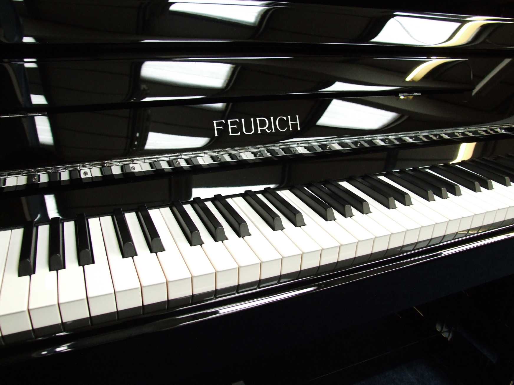 Feurich 122 upright Piano in bright black – Gallery image – Roberts Pianos Oxford