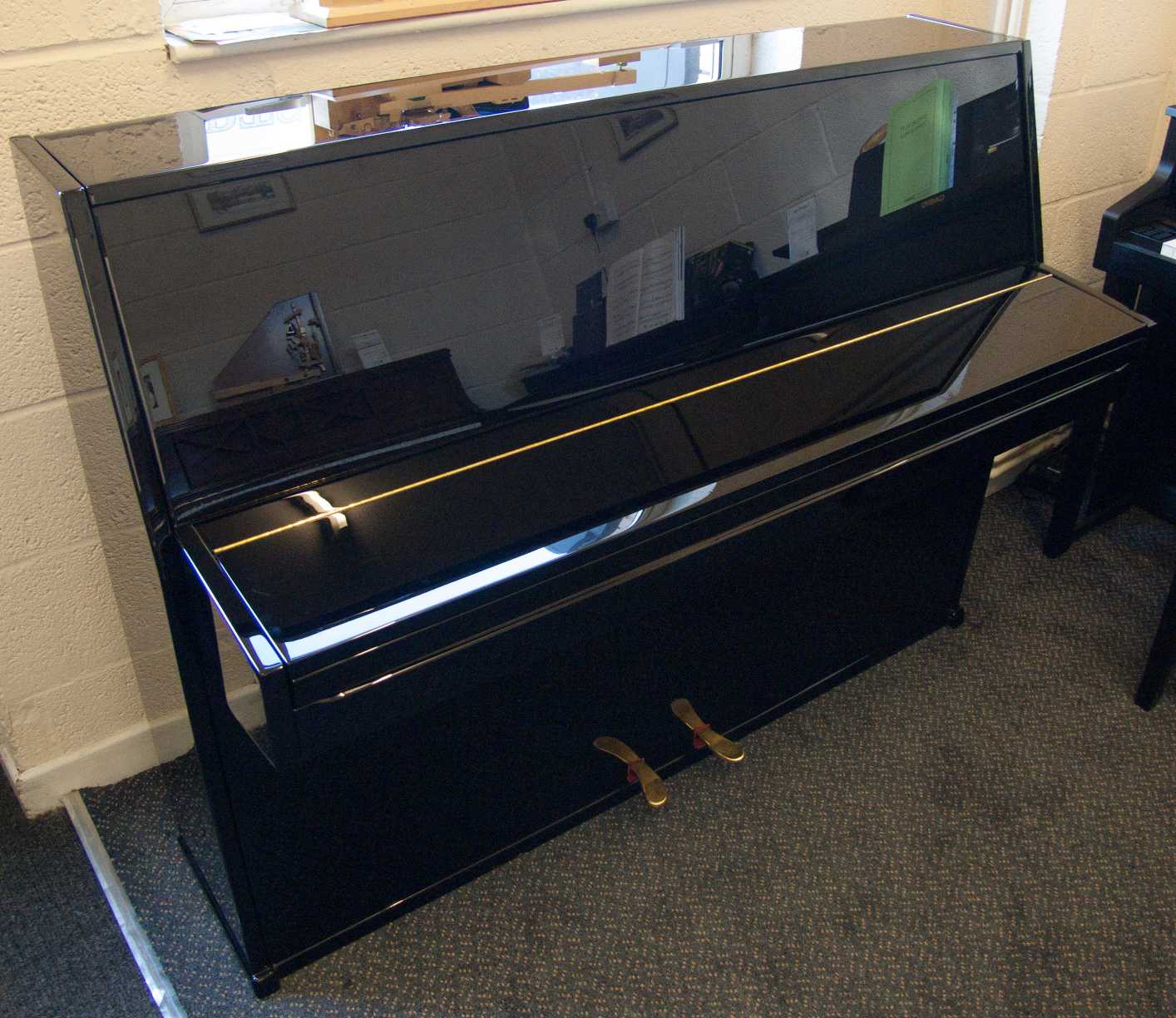 Welmar upright Piano in black polyester – Gallery image – Roberts Pianos Oxford