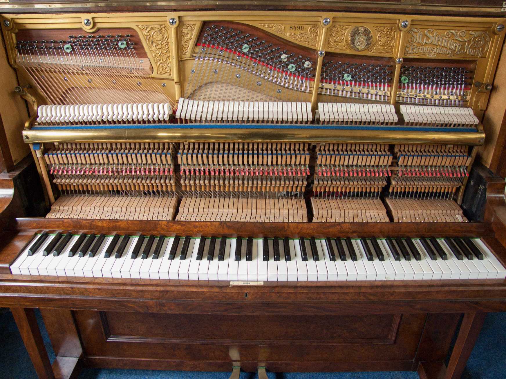 Grotrian Steinweg upright Piano in walnut – Gallery image – Roberts Pianos Oxford