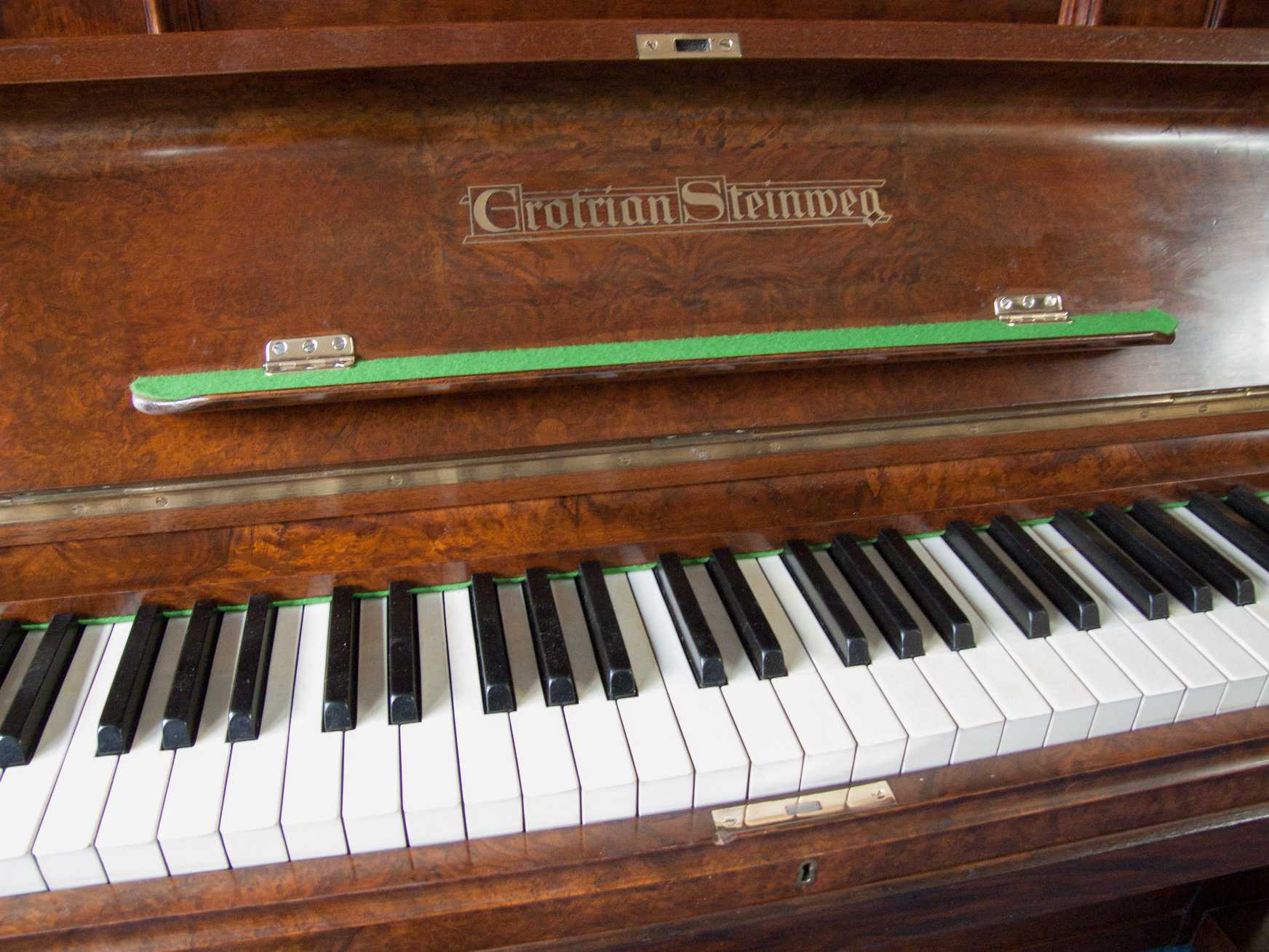 Grotrian Steinweg upright Piano in walnut – Gallery image – Roberts Pianos Oxford