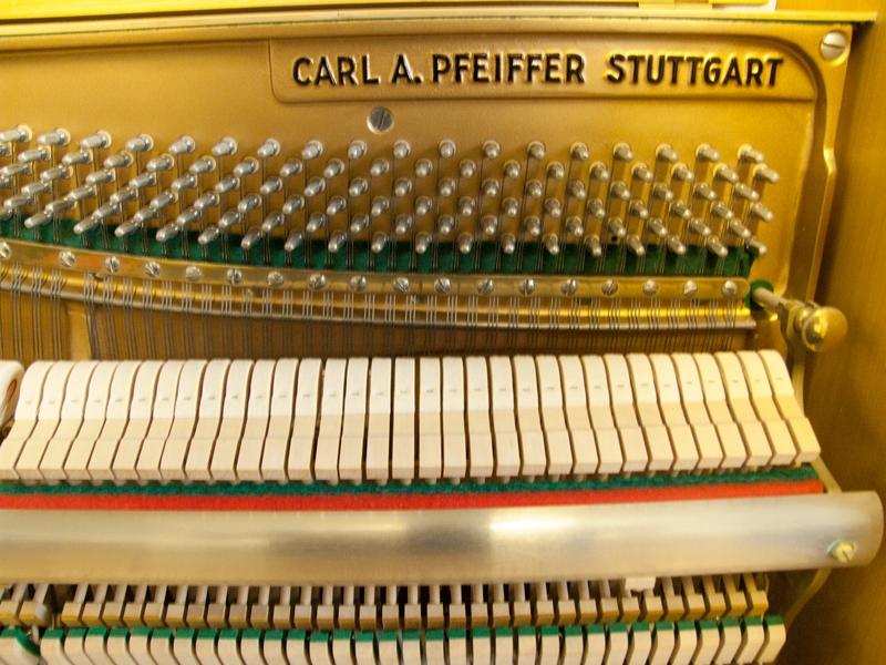 Pfeiffer 112 upright Piano in light crown-cut wood – Gallery image – Roberts Pianos Oxford
