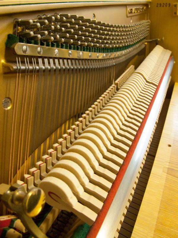Pfeiffer 112 upright Piano in light crown-cut wood – Gallery image – Roberts Pianos Oxford