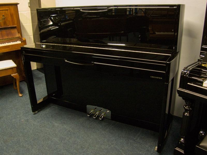Bechstein Advance upright Piano in black polyester – Gallery image – Roberts Pianos Oxford