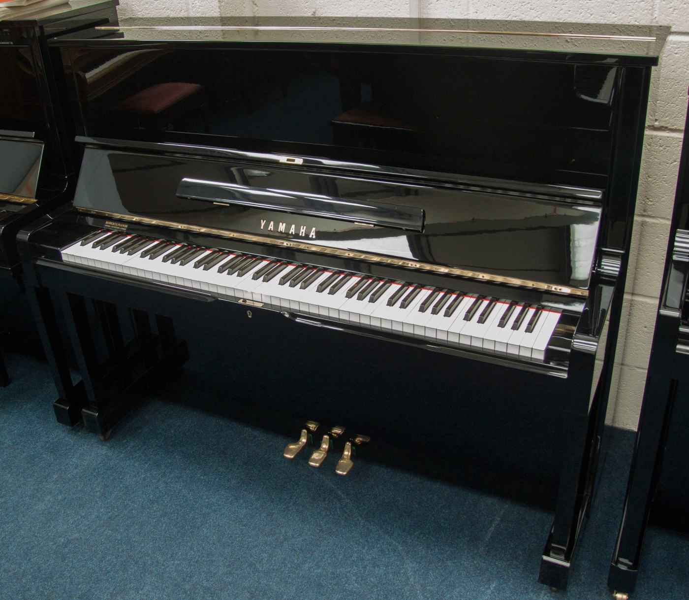 Yamaha U1H upright Piano in Bright black – Featured image – Roberts Pianos Oxford