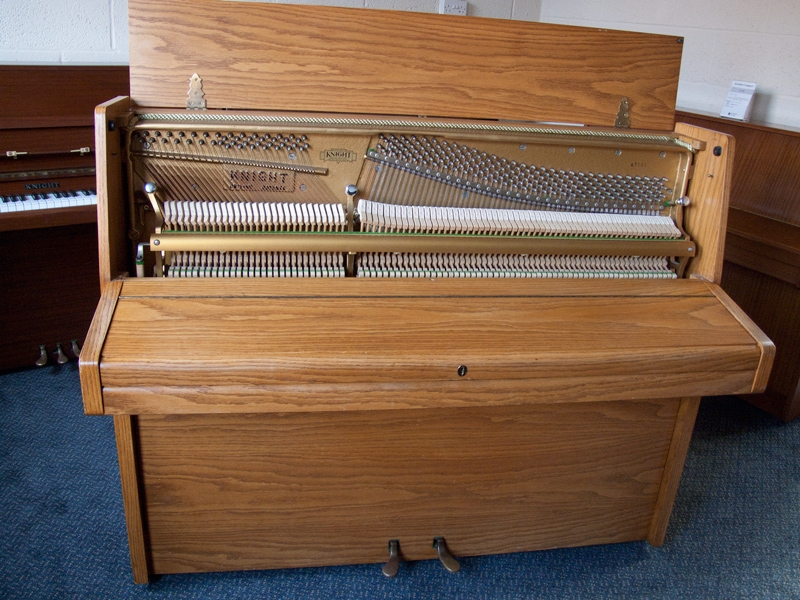 Knight K10 upright Piano in oak – Gallery image – Roberts Pianos Oxford