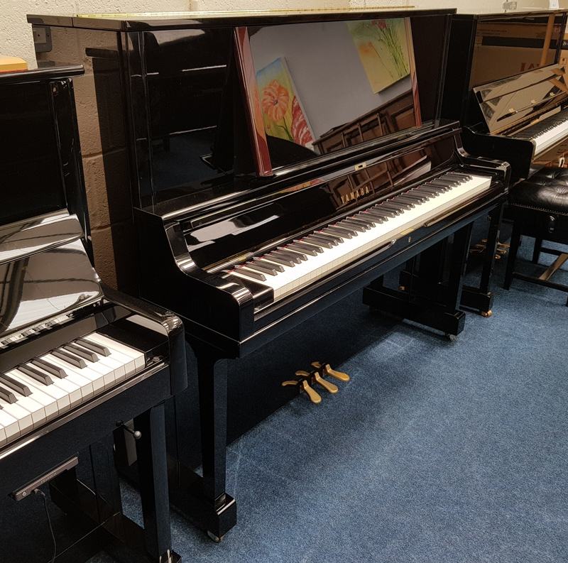 Yamaha YUS5 upright Piano in bright-black – Featured image – Roberts Pianos Oxford