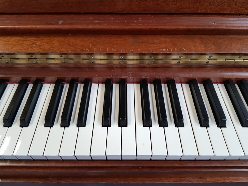 Steinway upright Piano in light satin walnut – Gallery image – Roberts Pianos Oxford