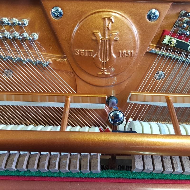 Feurich 125 upright Piano in Black – Gallery image – Roberts Pianos Oxford