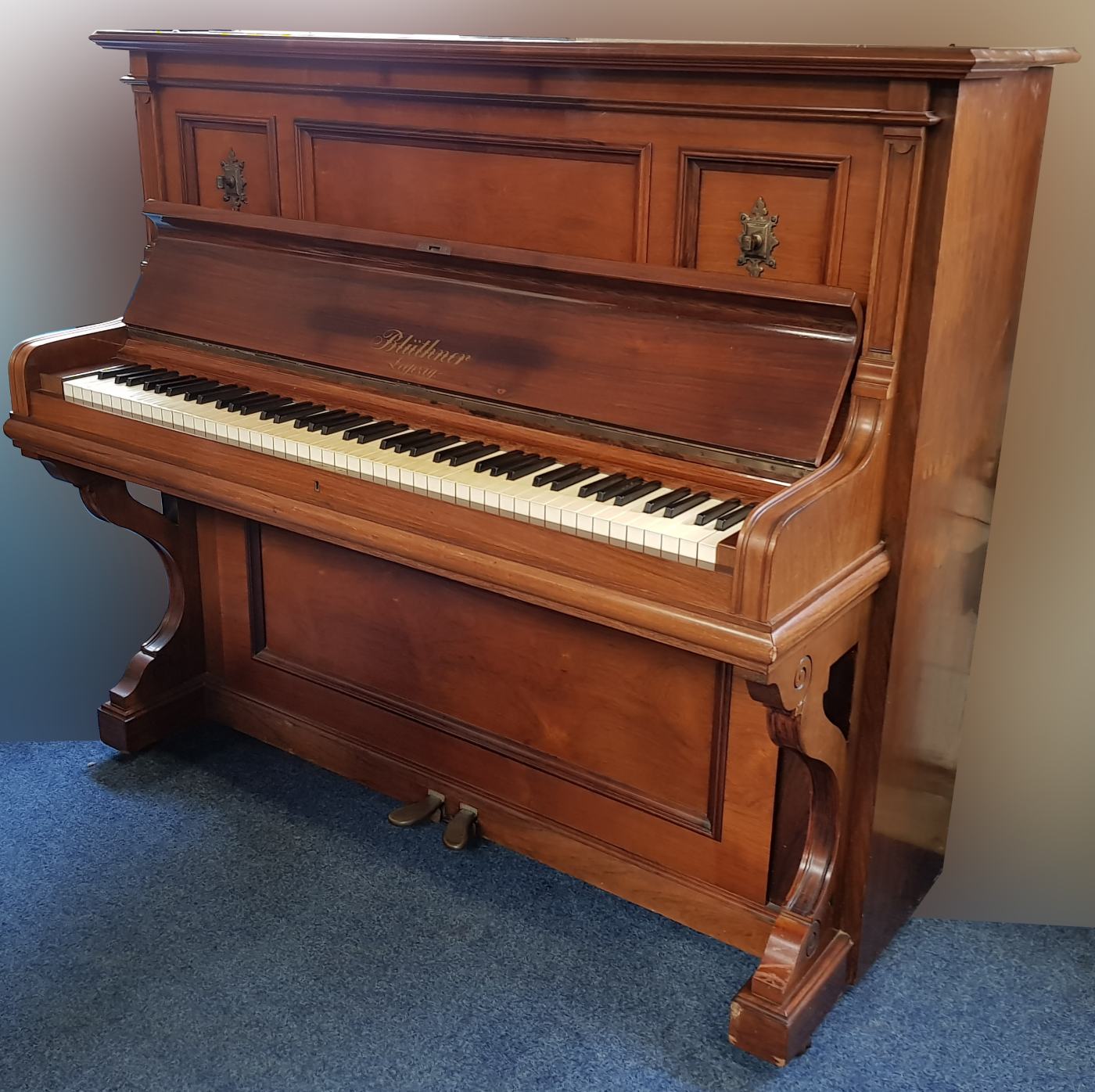 Bluthner upright Piano in rosewood – Featured image – Roberts Pianos Oxford