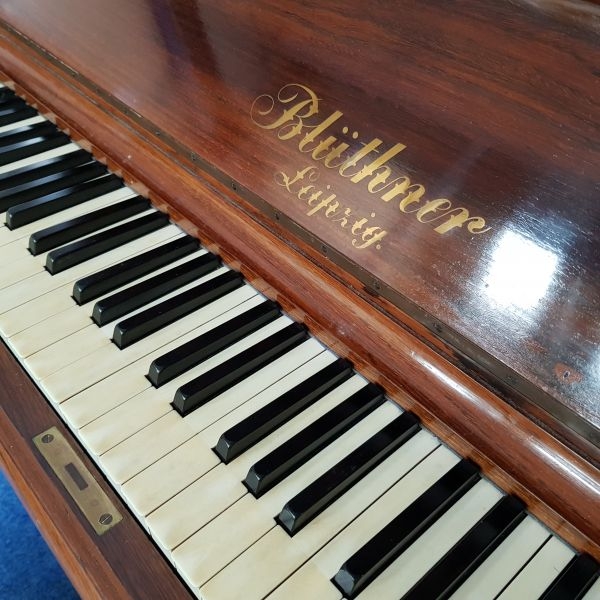 Bluthner upright Piano in rosewood – Gallery image – Roberts Pianos Oxford