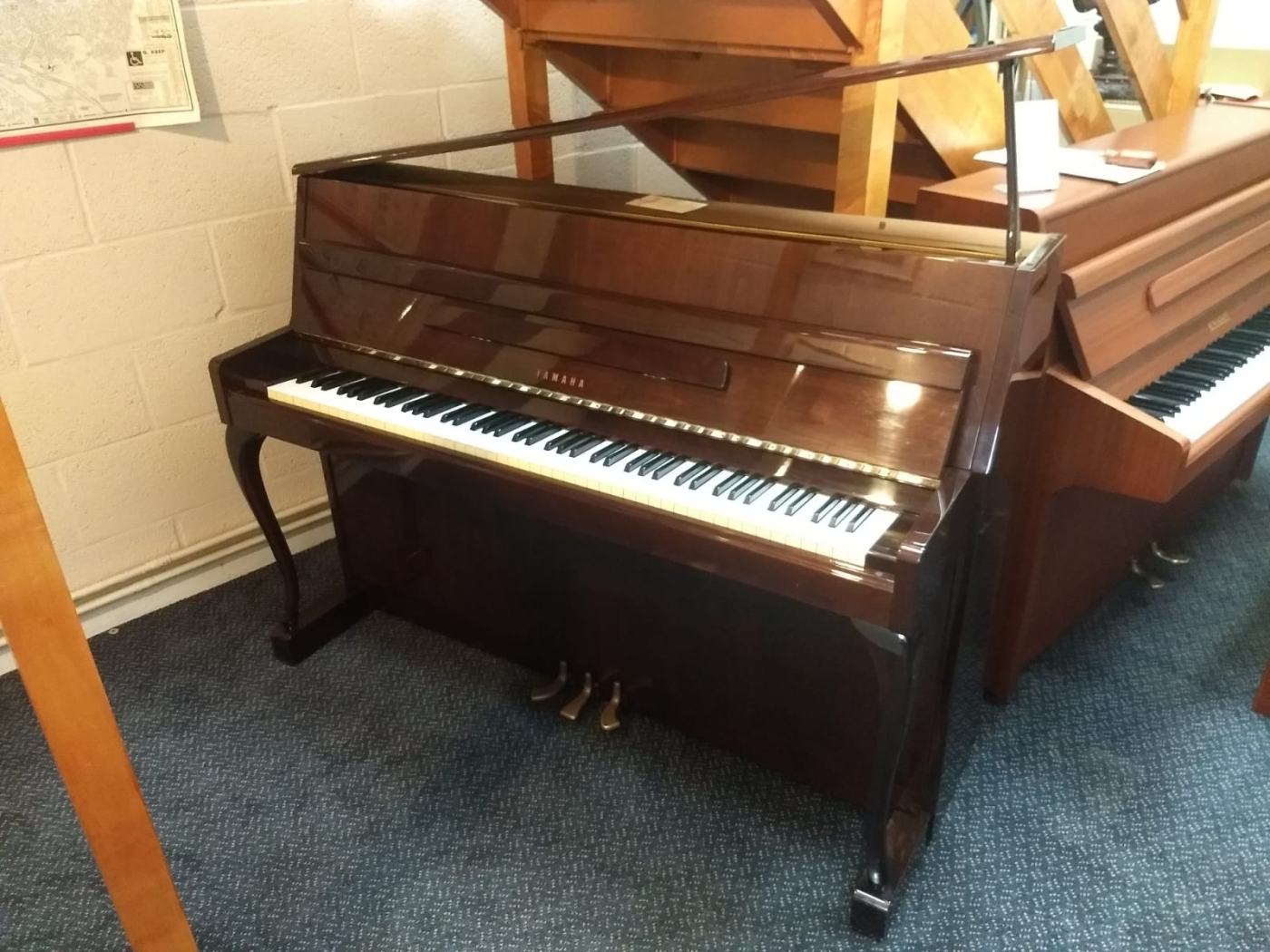 Yamaha M1S upright Piano in Bright walnut – Featured image – Roberts Pianos Oxford