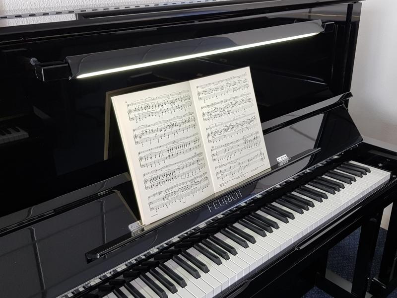 Feurich 133 upright Piano in gloss black – Gallery image – Roberts Pianos Oxford