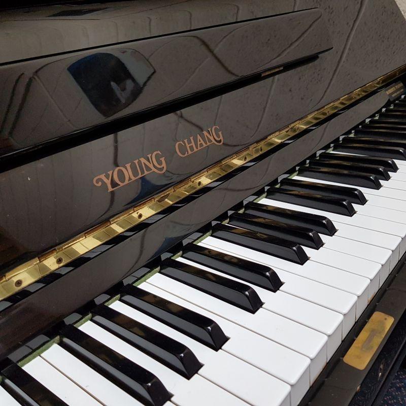 Young Chang upright Piano in black – Gallery image – Roberts Pianos Oxford