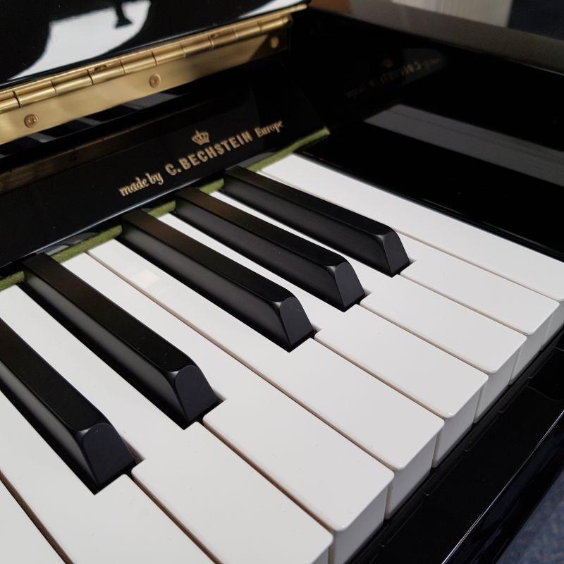 Hoffmann Bechstein T128 upright Piano in bright black – Gallery image – Roberts Pianos Oxford