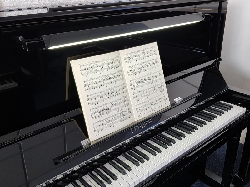 Feurich 133 upright Piano in Black – Gallery image – Roberts Pianos Oxford