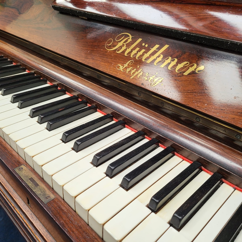 Bluthner upright Piano in rosewood – Gallery image – Roberts Pianos Oxford