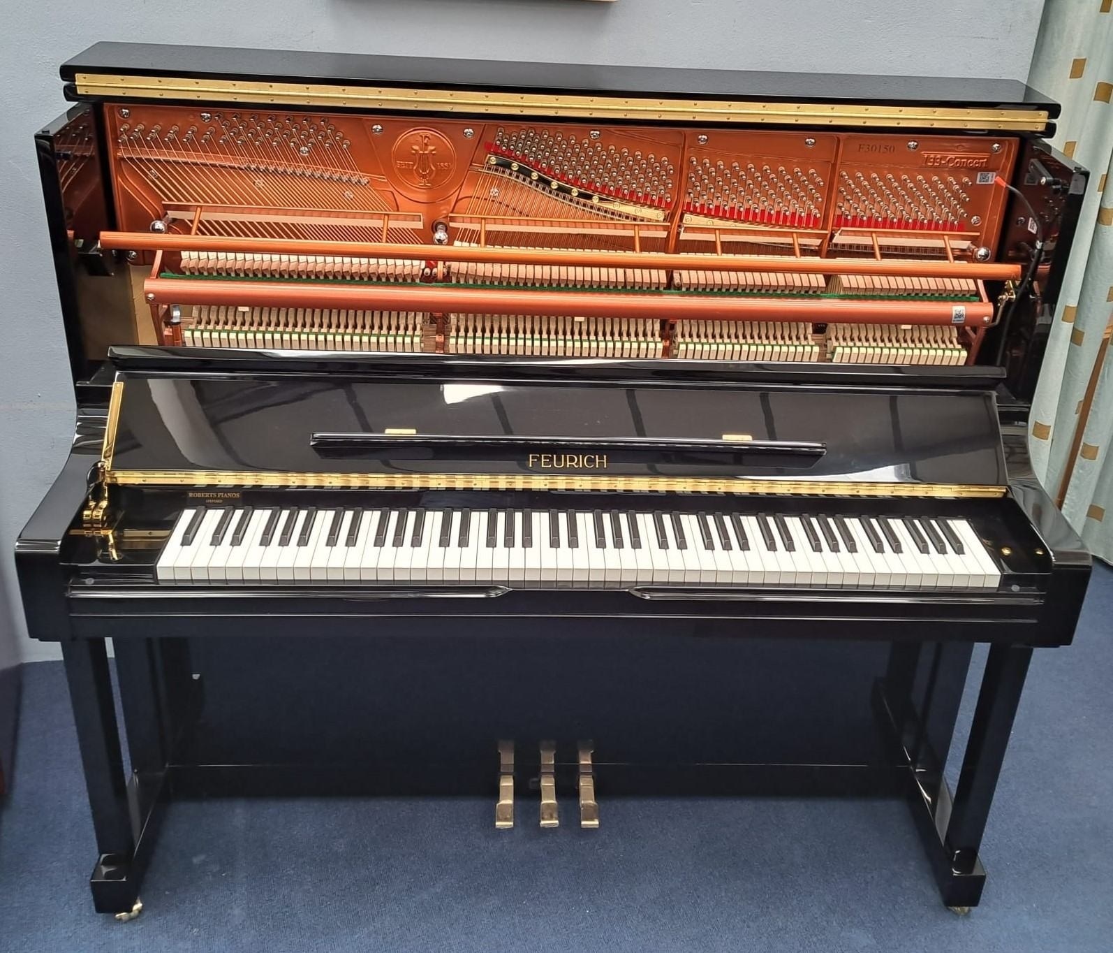 Feurich 133 upright Piano in gloss black – Gallery image – Roberts Pianos Oxford
