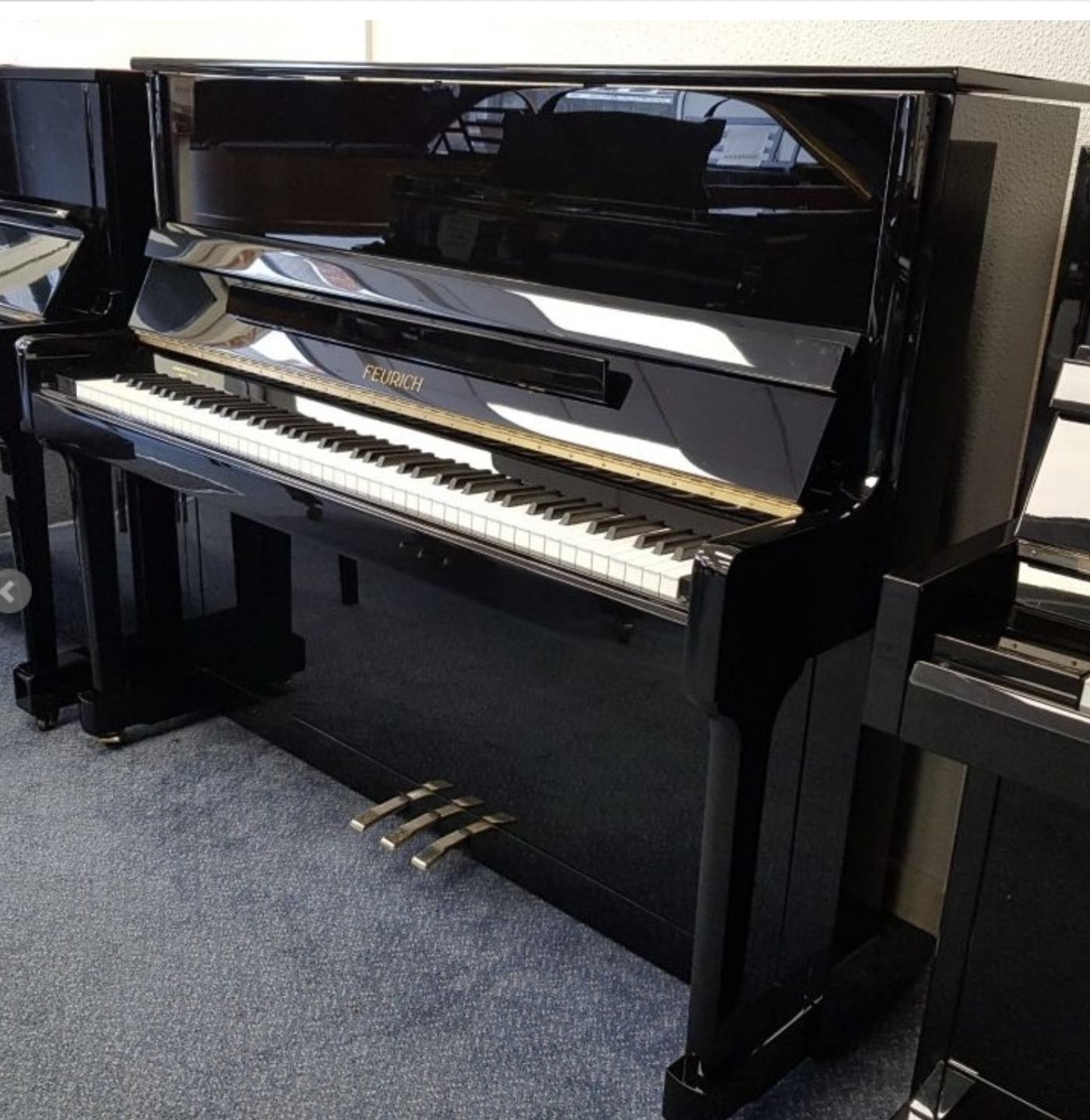 Feurich 122 upright Piano in Black – Featured image – Roberts Pianos Oxford