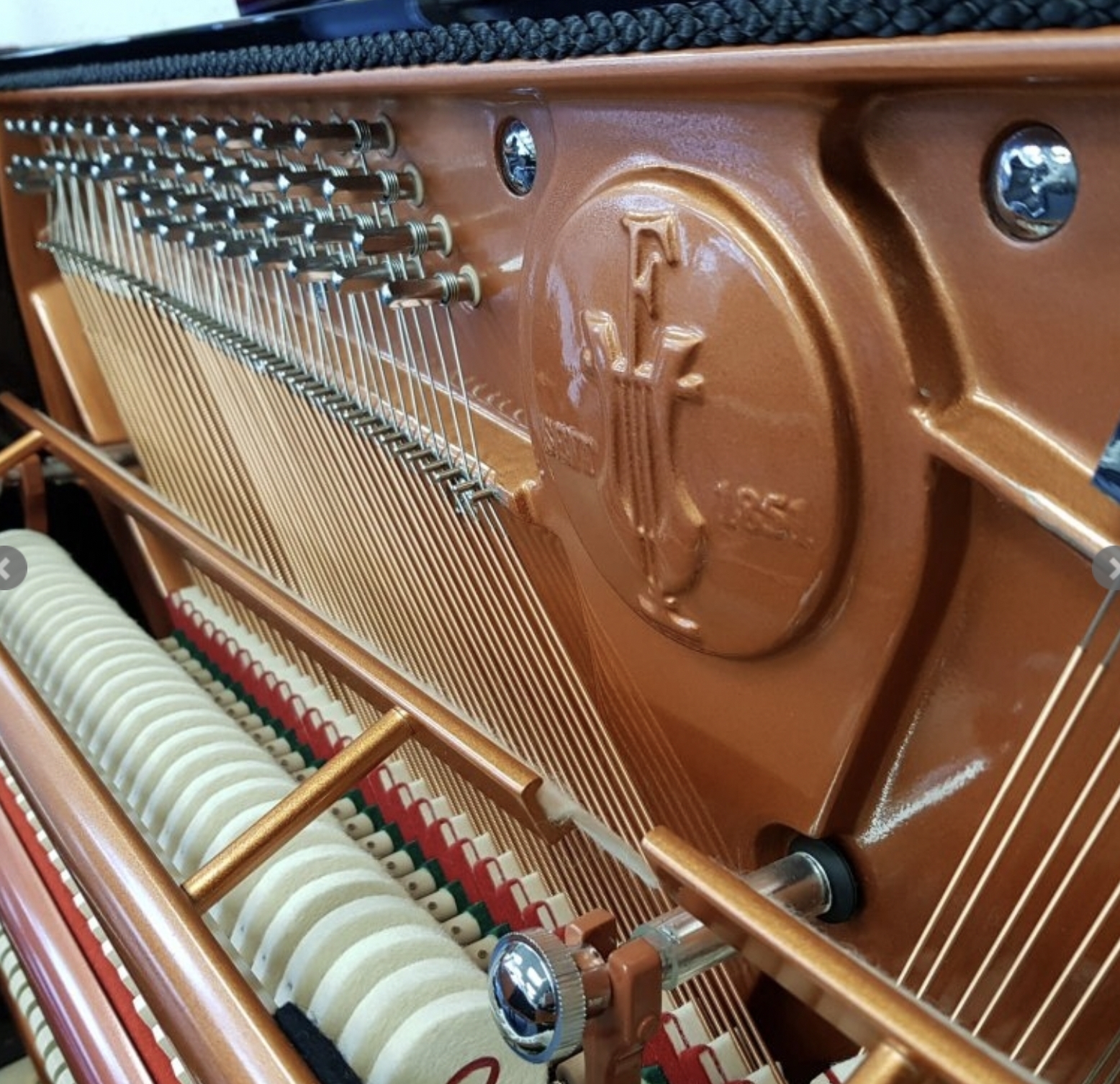 Feurich 122 upright Piano in Black – Gallery image – Roberts Pianos Oxford