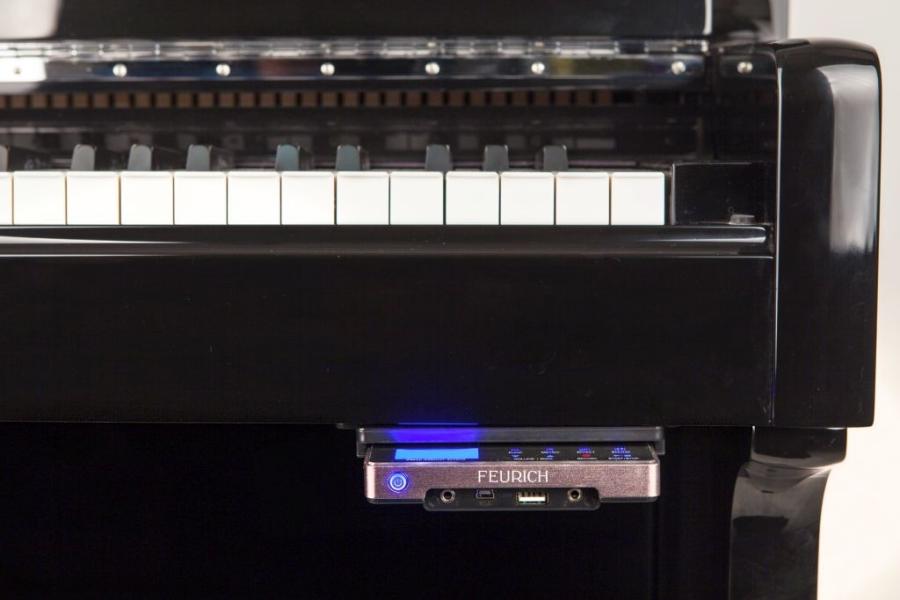Feurich 122 Silent System upright Piano in bright black – Gallery image – Roberts Pianos Oxford