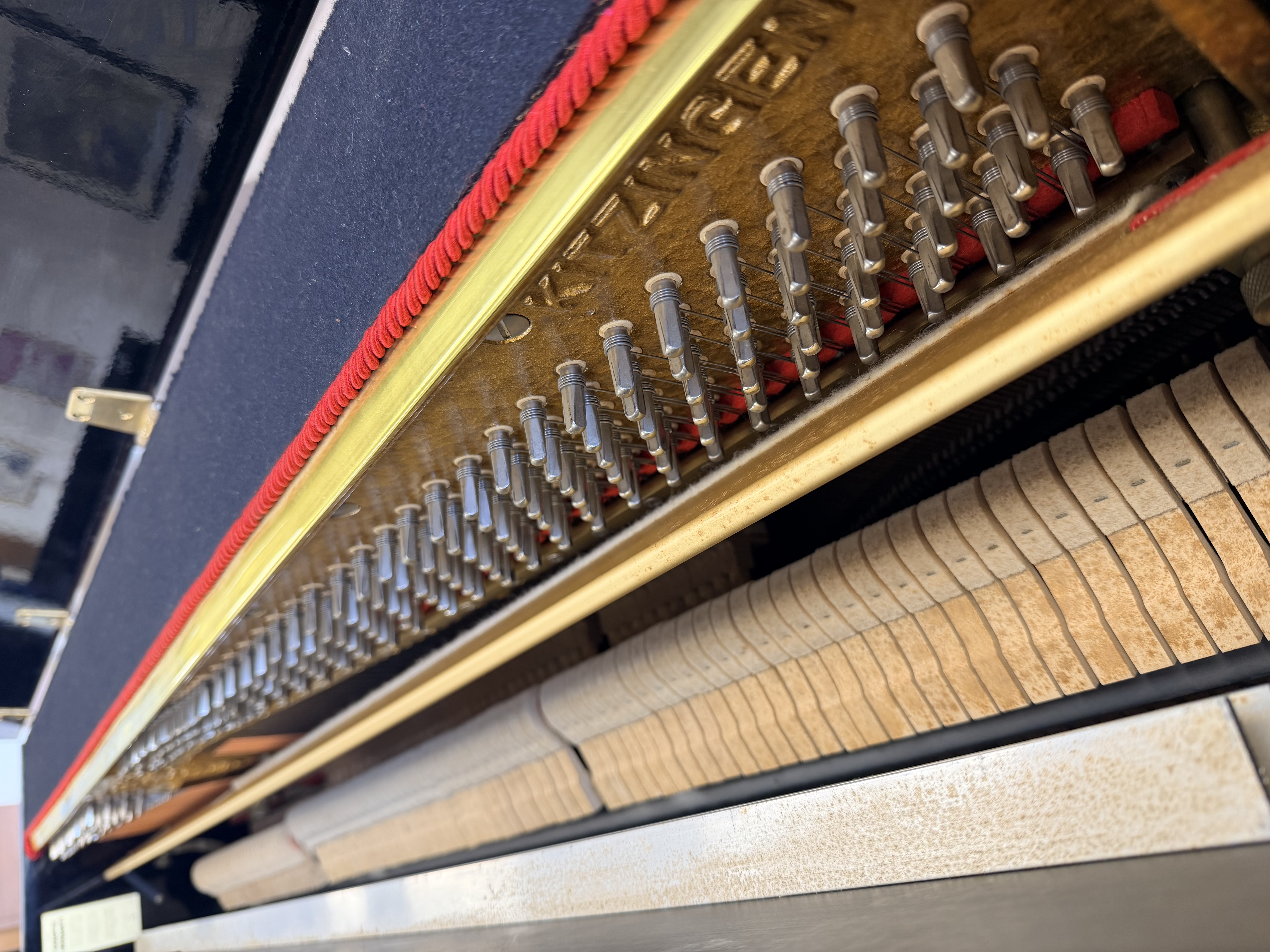 Seiler 116 Upright Piano in Black Polyester – Gallery image – Roberts Pianos Oxford