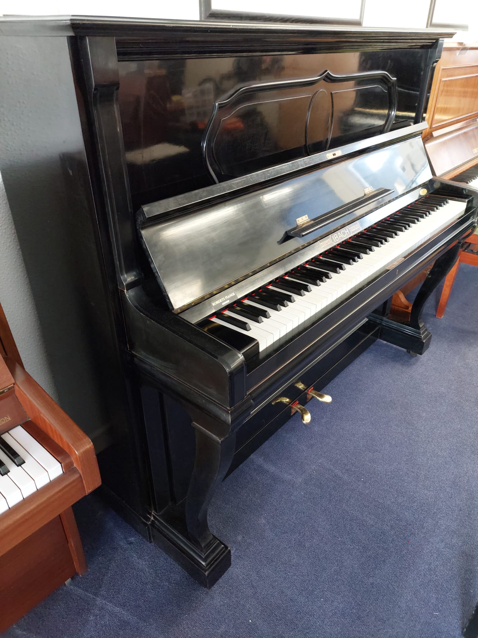 Ibach 130 Upright Piano in Black Polyester – Gallery image – Roberts Pianos Oxford