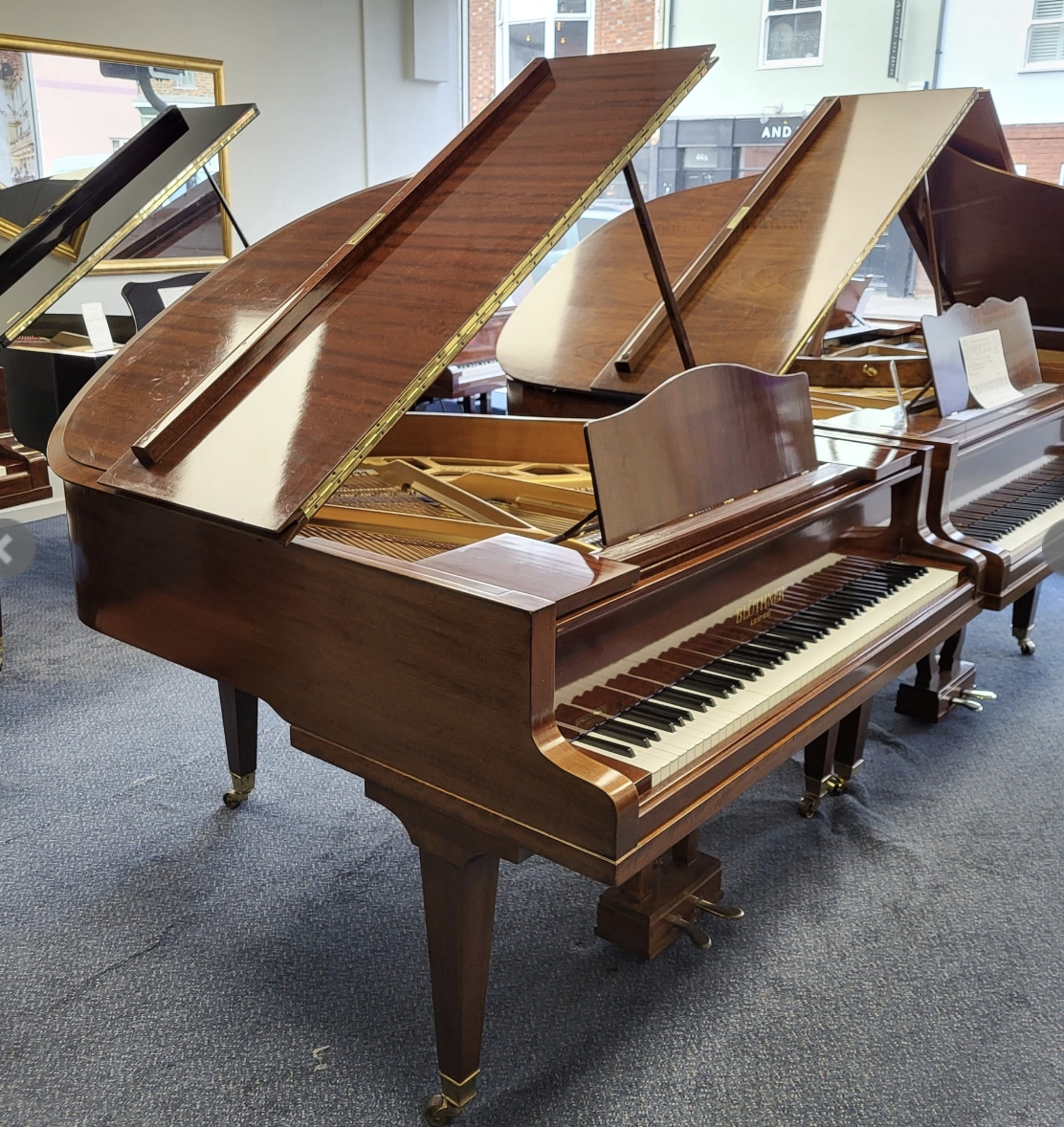 Bluthner upright Piano in rosewood – Gallery image – Roberts Pianos Oxford