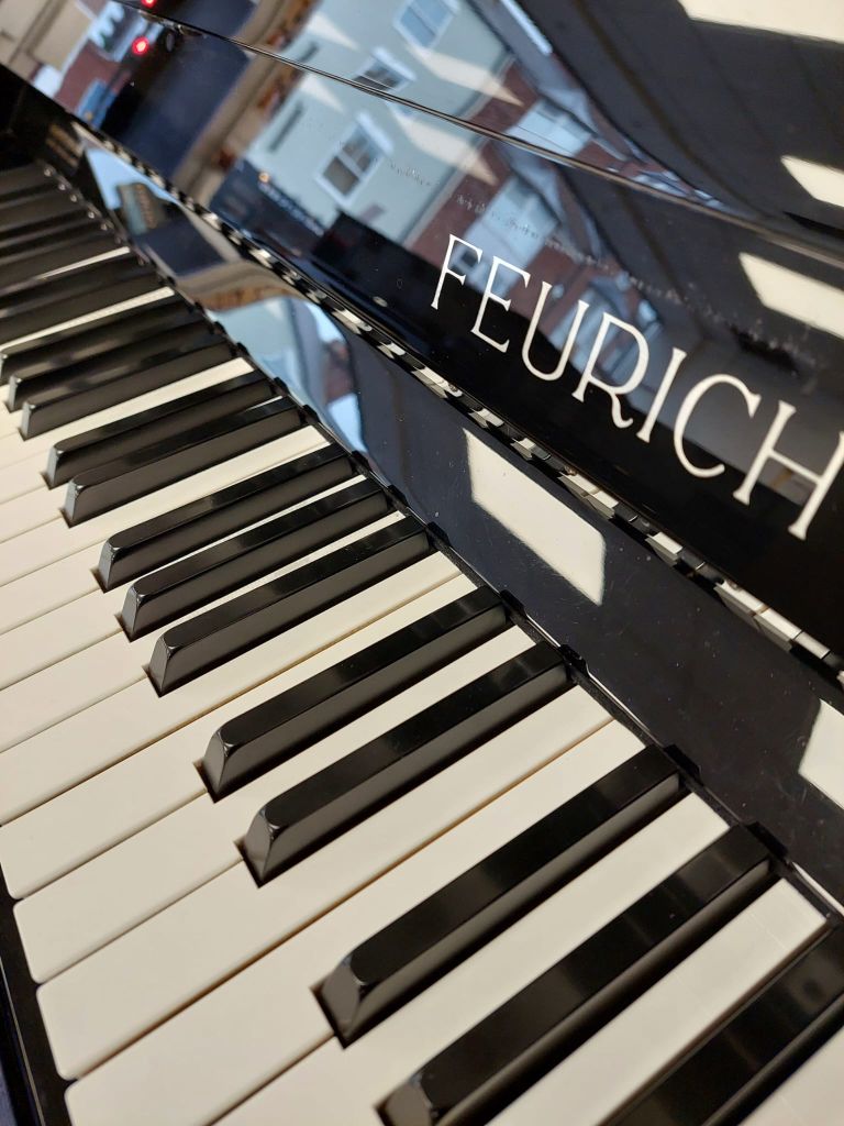 Feurich 122 upright Piano in Black Gloss – Gallery image – Roberts Pianos Oxford