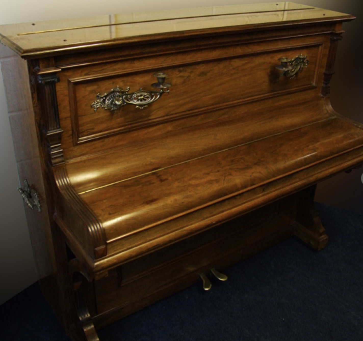 Bluthner upright Piano in rosewood with sconces – Gallery image – Roberts Pianos Oxford