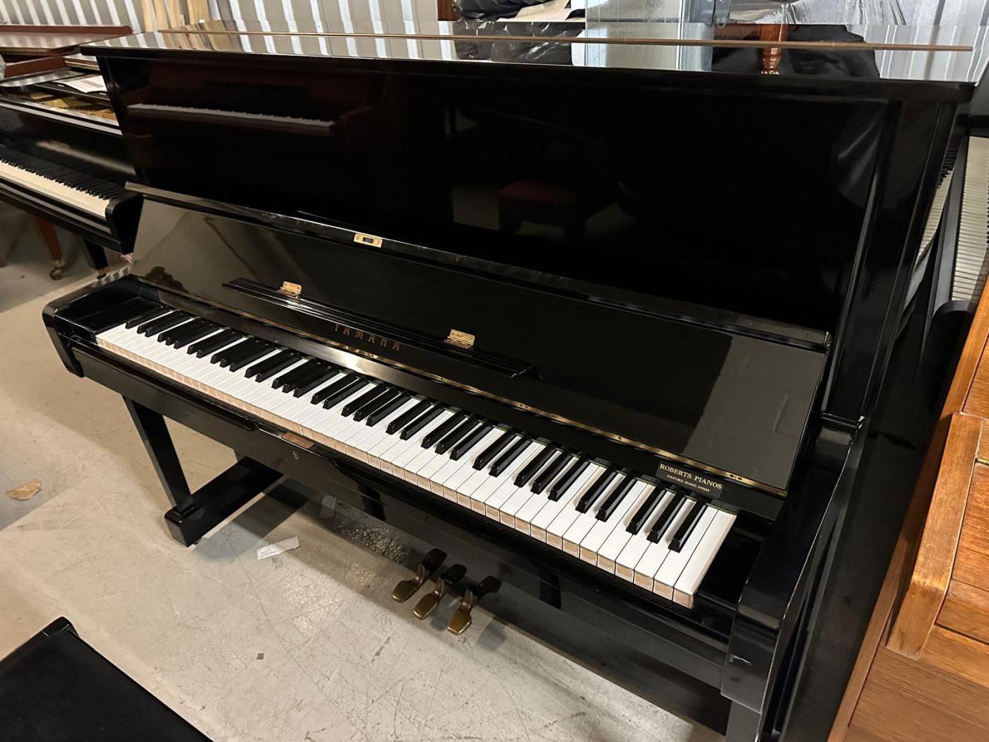 Yamaha U1H upright Piano in bright black – Featured image – Roberts Pianos Oxford