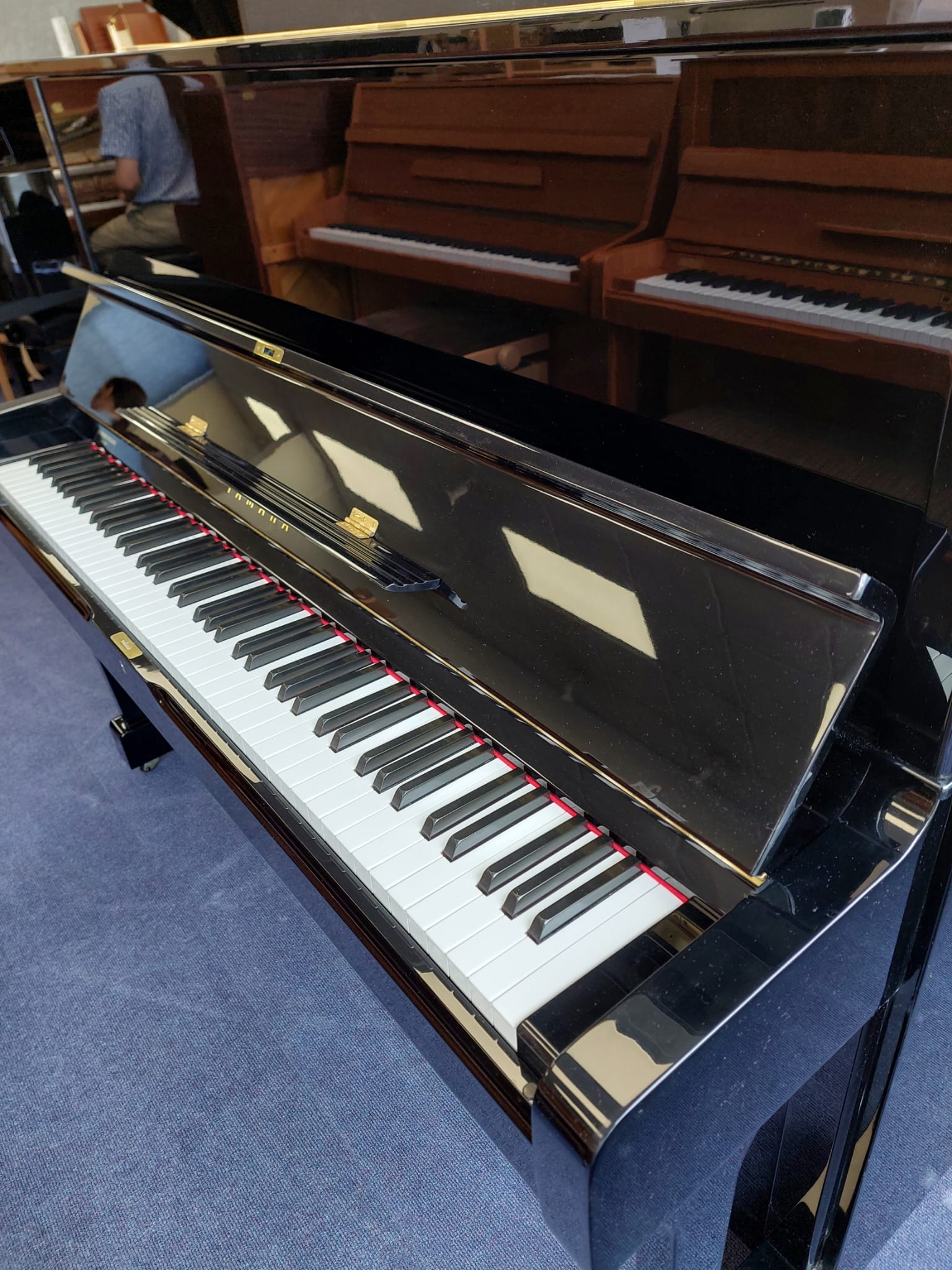 Yamaha U1M Upright Piano in Black Polyester – Gallery image – Roberts Pianos Oxford