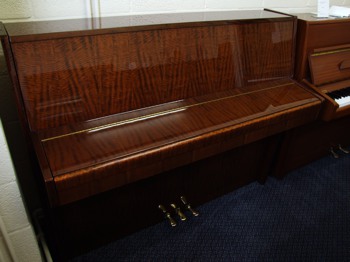 Ibach upright piano lid closed in mahogany