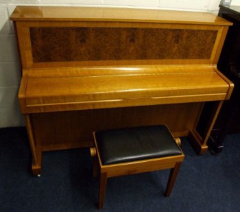 A taller Kemble upright; this one is of very high quality.
