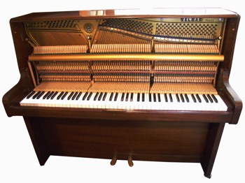 View of the inside of an Welmar upright piano