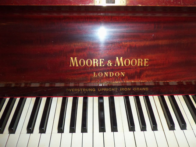 Typlical Moore and Moore logo on pianos form about 1900 to 1920